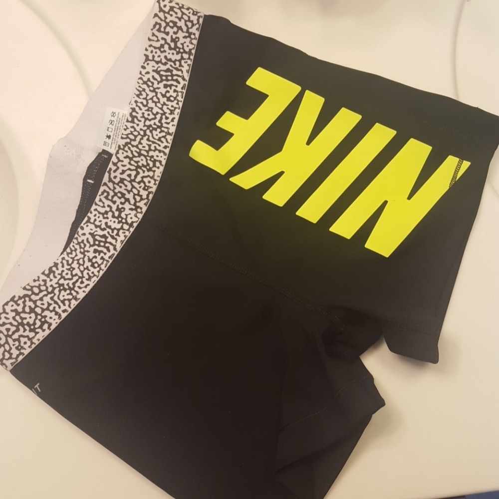 Nike shorts. The tag says medium. I wear a size 4.